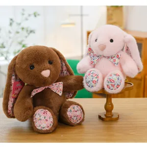 Cute floral long-ear bunny plush toy, soft stuffed animal doll for home decor and healing gift.