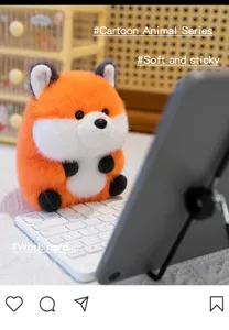 Cute chubby fox plush toy detail, soft stuffed animal doll for desk companion and room decor.
