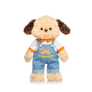 Cute plush puppy toy wearing blue denim overalls and orange t-shirt, perfect birthday gift.