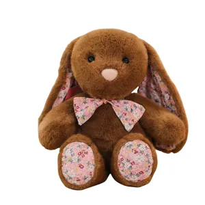 Cute brown long-eared bunny plush toy with pink floral pattern, soft stuffed animal doll for home decor