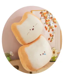 Close-up detail of cute toast shaped plush pillow showing soft texture and cozy home decor scene.