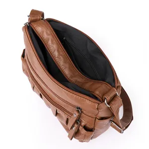 Brown multi-zipper shoulder bag large capacity casual crossbody bag for women daily use.