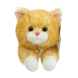Cute lying ginger cat plush toy with blessing bell, soft stuffed animal doll for gifts.