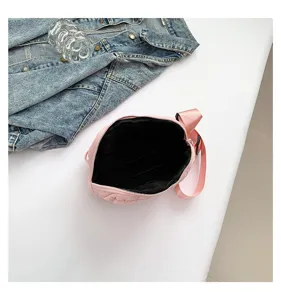 Pink quilted crossbody bag for women, stylish multi-use waist bag and casual chest bag.