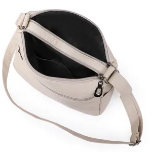 Multi-pocket soft leather shoulder bag with spacious compartments and adjustable strap.