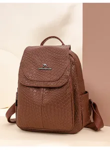 Brown woven synthetic leather backpack for women, featuring soft texture and spacious storage.