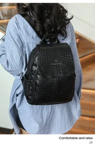Woven leather backpack for women, stylish casual large capacity travel anti-theft bag.