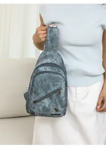 Women grey PU leather sling chest bag, casual crossbody daypack with multiple zip pockets.