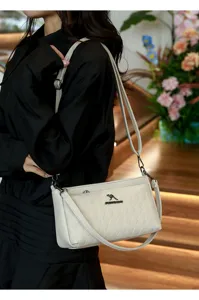 Stylish quilted shoulder bag for women, chic crossbody purse with adjustable strap, white.
