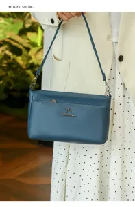 Blue soft leather shoulder crossbody bag detail view, featuring metallic hardware and strap.
