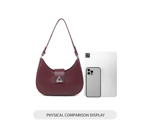 Burgundy crescent shoulder bag underarm hobo purse with metal triangle buckle detail