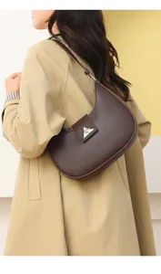 Brown leather shoulder bag, chic crescent hobo handbag for women, stylish daily accessory.