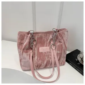 Fashion pink corduroy tote bag for women, large capacity shoulder bag with stylish chain straps.