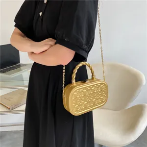 Stylish gold chain crossbody box bag for women, elegant embossed retro clutch handbag.