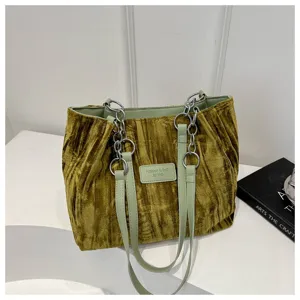 Green velvet tote bag for women, large capacity shoulder bag with chain straps and chic design.