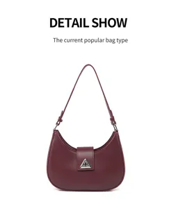 Chic burgundy crescent shoulder bag for women, trendy minimalist underarm hobo bag 2026.