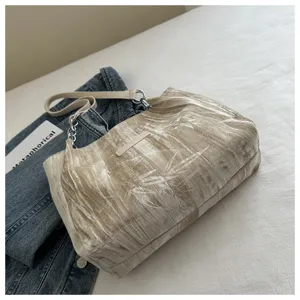 Chic champagne velvet tote bag with chic chain strap, versatile large capacity shoulder bag.