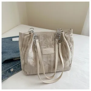 Women's casual pleated tote bag with chain strap, large capacity canvas shoulder bag for daily commute.