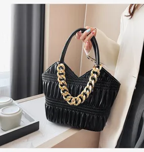 Elegant black pleated handbag with chunky gold chain handle for women stylish daily use.