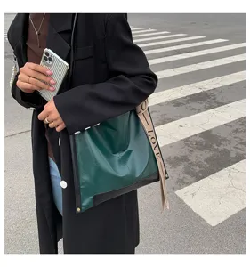 Grande borsa a tracolla da donna, elegante borsa secchiello da lavoro con cinturino.