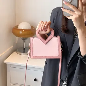Rosa Umhängetasche mit Herzgriff für Damen, stilvolle PU Leder Handtasche Schultertasche.