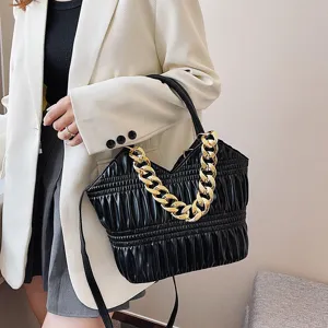 Stylish black gathered shoulder bag for women with chunky gold chain, trendy crossbody tote.
