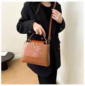 Brown crocodile pattern top-handle shoulder bag with metallic V logo for women chic daily