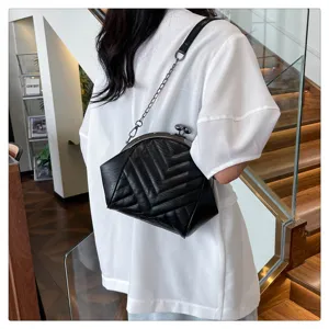 Black chevron quilted leather shoulder bag with metal chain strap and kiss lock closure detail.