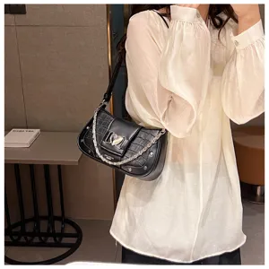 French niche chain underarm bag for women, black crocodile pattern shoulder baguette bag.