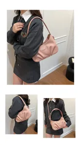 Pink pleated underarm shoulder bag for women, stylish casual crossbody purse daily use.