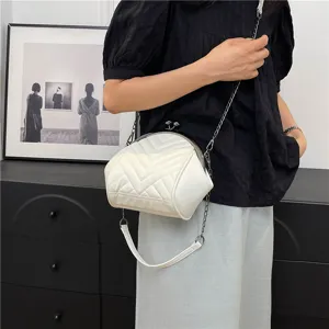 White quilted chevron kiss-lock shoulder bag with metal chain strap for women chic daily use.