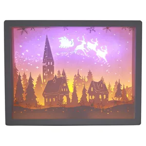 Kerst 3D papier snijwerk nachtlamp schaduwbox met warme LED verlichting en vakantie decor.