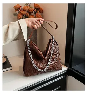Brown pleated shoulder bag for women, retro PU leather tote with stylish metal chain detail.