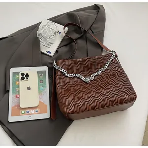 Brown pleated shoulder bag with chain detail, vintage large capacity commuter tote bag for women.