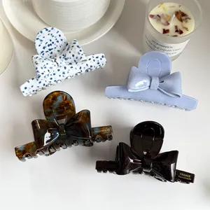 Elegant bow hair claw clips acetate shark clips for women daily styling and hair accessories.