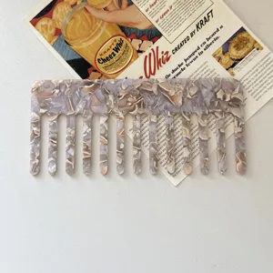 Acetate wide tooth hair comb with stylish marble pattern for anti static daily hair styling.