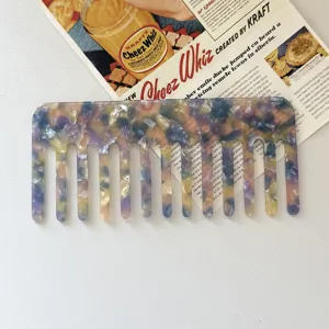 Acetate wide tooth hair comb with stylish marble pattern, anti static design for daily use detail.