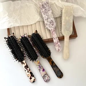 Cat ear acetate hair brush with boar bristles detail view, perfect for daily styling.