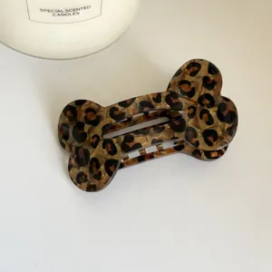 Pince à cheveux motif léopard os, griffe en acétate style doux et cool pour coiffure quotidienne.