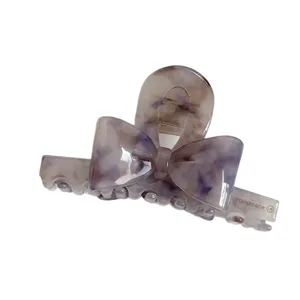 Korean style acetate hair claw clip featuring a chic double-sided 3D bow design in purple.