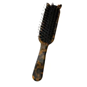 Tortoiseshell acetate hairbrush with boar bristles and cute cat ears design for daily hair styling.