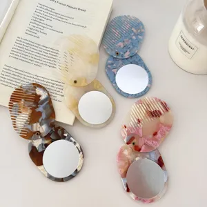 Tragbarer Klappspiegel Kamm aus Acetat, elegantes Marmor Muster, Make-up Haarbürste klein.