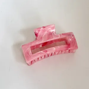Pinza de pelo de acrílico jaspeado rosa, elegante diseño rectangular para peinado diario versátil.