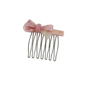 Korean style pink acetate bow insert comb, elegant hair accessory for women's hairstyles.