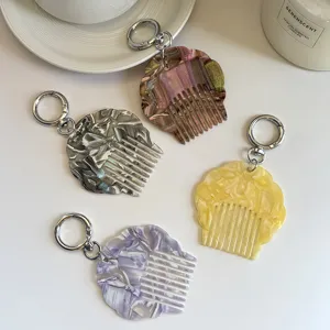 Portable mini acetate shell comb keychain stylish marble pattern bag charm for women