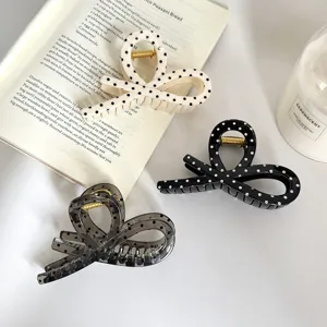 Molla per capelli a pois grande ed elegante fermaglio da donna accessorio alla moda vista dettaglio