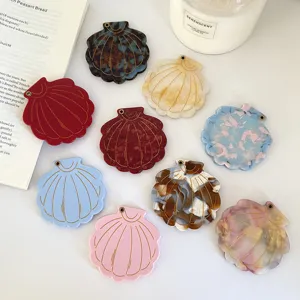 Detailed shot of trendy acetate shell pocket mirrors in various stylish colors and textures.