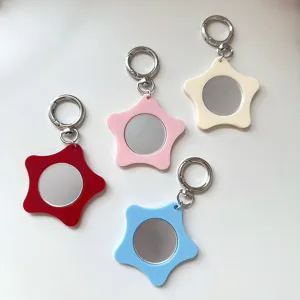Star shape pocket makeup mirror keychain pendant detail view, colorful portable mini mirror
