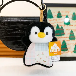 Cute penguin plush toy pendant with soft beanbag filling, perfect for office stress relief.
