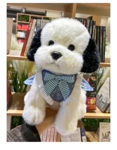 Joli jouet en peluche pour chien avec robe à fleurs et nœud, adorable chiot poupée.